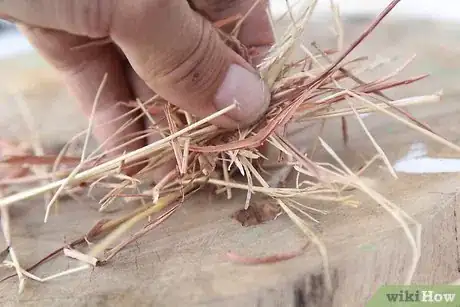 Step 5 用炭布接住火花并一直烧到炭布变成灰烬。