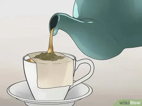 Step 7 喝抹茶或绿茶帮助减肥。