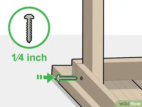 Step 4 用紧固螺丝把桌腿固定到裙板上。