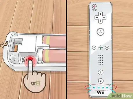 Step 4 按下并松开Wii遥控器背面的“同步”按钮。