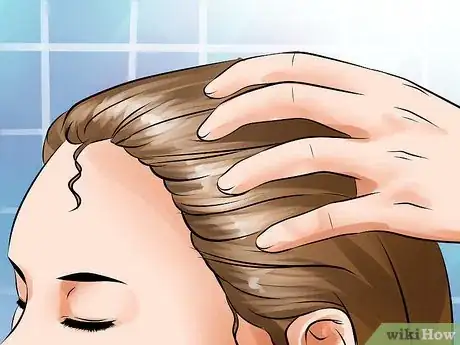 Step 2 涂抹蓖麻油。