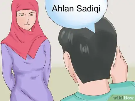 Step 5 用“Ahlan sadiqi”或“Ahlan sadiqati”来跟亲近的朋友问好。