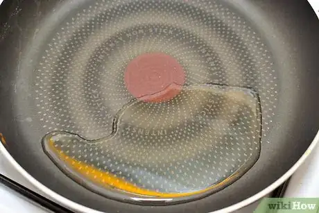 Step 3 加热橄榄油。