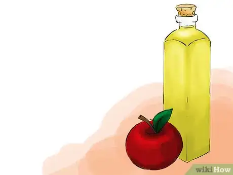 Step 3 将苹果醋和其他护发素混合使用来对抗干燥头皮。
