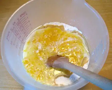 Add the yolk mixture.