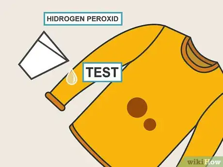 Step 1 在衣物上一小块地方测试双氧水的效果。
