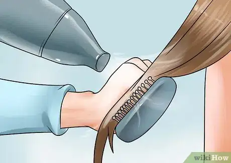 Step 3 用正确的方法将头发吹干。