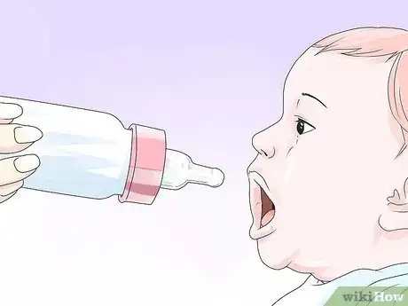 Step 2 将母乳喂养换成奶瓶。