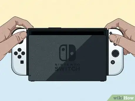 Step 8 把Switch插入底座中。