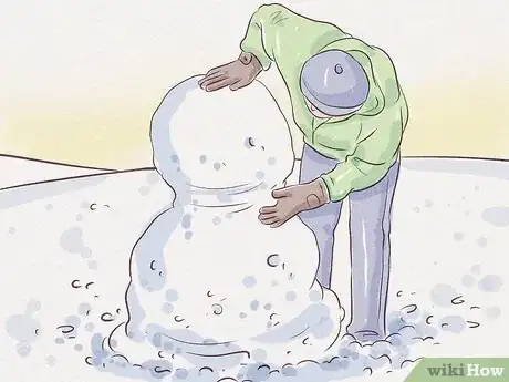 Step 4 把中号雪球抬到大号雪球上。