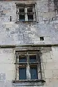 Two mullioned windows on the north facade