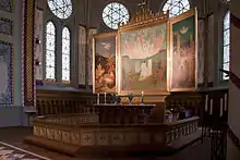 chancel with altar and altarpiece.