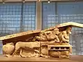 Pediment with Dionysos at the Corfu Museum. Left part of an Archaic pediment from the area of Figareto. It depicts  a Dionysiac symposium. Dated to 500 BC.