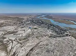 Aerial photograph showing the village and river