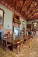 The Dining Room's oak ceiling with strapwork and pendants in the English Tudor style.