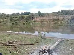 Camp scene on river in Tselinny District