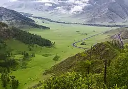 View of the village (in the background) from the chike-taman pass