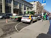 Evacuation of incorrectly parked carsharing vehicle at Pravda street in Moscow.