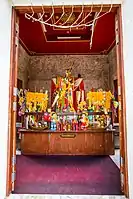 The inside of Phan Thai Norasing's shrine containing the real-size statue of him