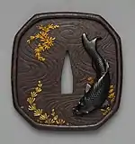 Tsuba with the Koi and Seaweed Motif, made by Kansai, Edo period, The Metropolitan Museum of Art.