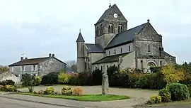 The church and menhir in Champigneul-Champagne