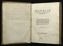 Title page of 1543 edition of Nicolaus Copernicus' book De Revolutionibus orbium coelestium which explained his theory of the earth orbiting the sun.