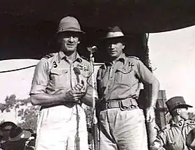 Three-quarters portraits of two men in tropical military uniform