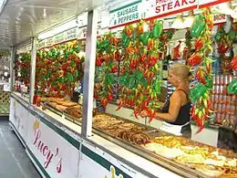 Street Vendors selling cheesesteak sandwiches, sausages and other foods lines the streets