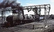 No. 748 Lukozi with a freight train at Sawmills, Zimbabwe, August 1992