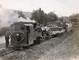 A mle 1914 being transported on a narrow gauge railway.