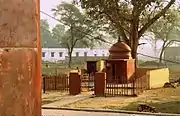 A woman worshipping at a Hindu temple nearby Platform No. 2