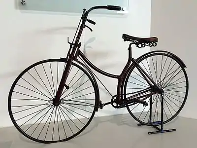 1886 Rover safety bicycle at the British Motor Museum. The first modern bicycle, it featured a rear-wheel-drive, chain-driven cycle with two similar-sized wheels. Dunlop's pneumatic tire was added to the bicycle in 1888.