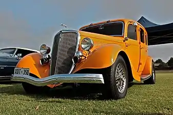 Somewhat milder tuned street rod without chopped top, based on 1934 Model 40B or B Fordor, claimed a Deluxe. The usual mixing parts in this genre avoids clear identification