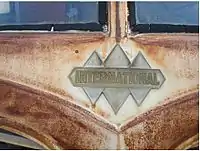 Triple diamond front emblem