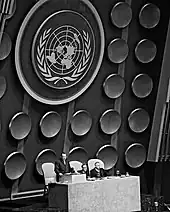 Escutcheons in the UNGA hall intended to be emblazoned with national arms, including France's., but removed in 1956.