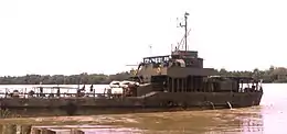 The large landing craft NRP Alfange supplying the garrison of Bambadinca 1973. During the Portuguese Colonial War, the village was an important Portuguese base