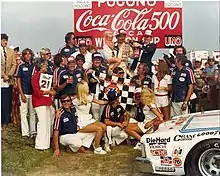 Neil Bonnett in the winner's circle after winning the 1980 Coca-Cola 500