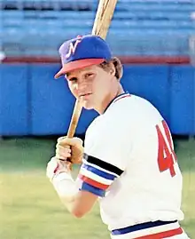 A baseball player in white