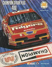 The 1991 Champion Spark Plug 400 program cover, featuring Mark Martin. Artwork by NASCAR artist Sam Bass.