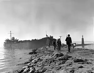 Division troops land at Pohang, Korea.