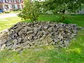 Foundation stones lying beside the moved building