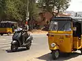 Honda Activa passing by an auto rickshaw in Krishnagiri