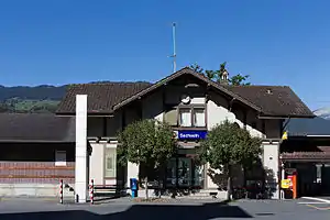 Two-story building with gabled roof