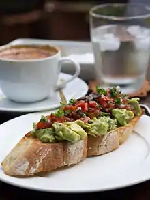 Image 167Avocado salad, tomato and salsa on a toasted baguette. (from 2010s in culture)