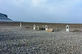 The four graves at Franklin Camp near the harbour on Beechey Island, Nunavut, Canada.