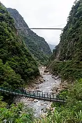 Zhuilu Suspension Bridge with road bridge behind it