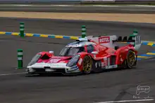 A red-and-white racing car