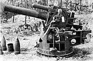 A captured 20 cm short gun with its ammunition.