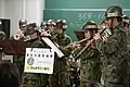 North Eastern Army Band playing for the 2011 Tōhoku earthquake and tsunami evacuees