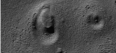 Close view of ring mold crater, as seen by HiRISE under HiWish program  Note: this is an enlargement of the previous image of a field of ring mold craters.